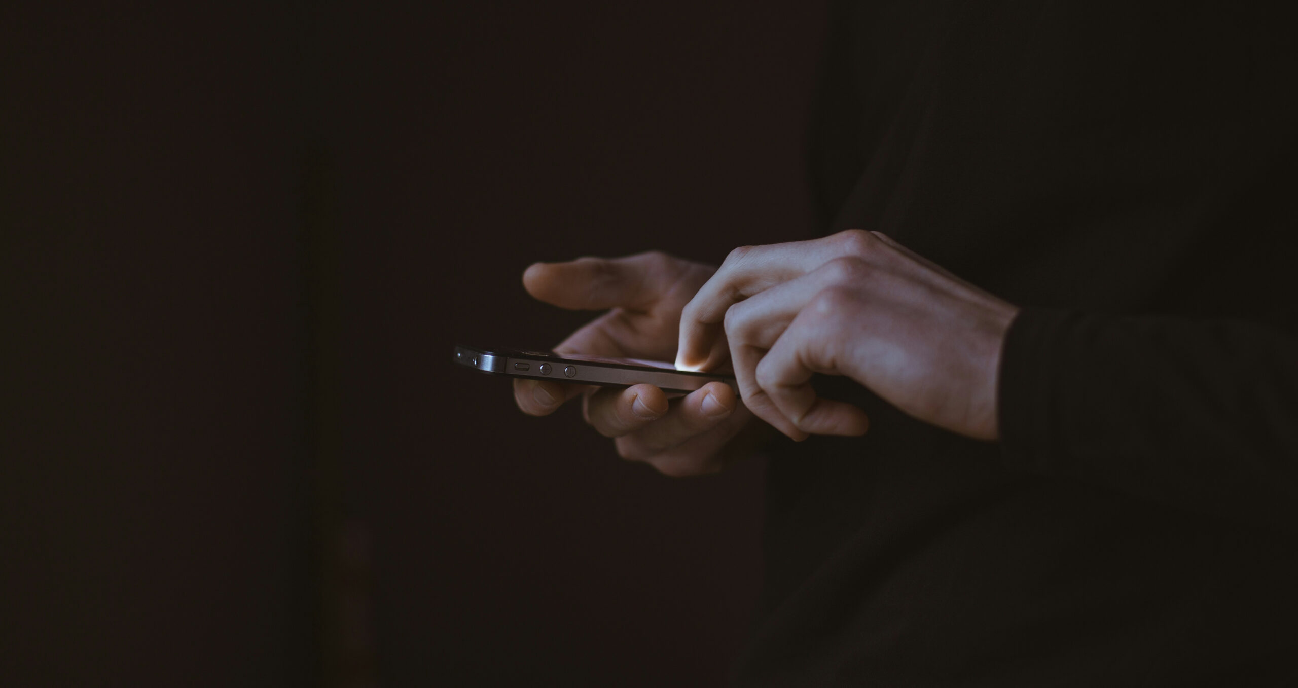 Hand holding a smartphone
